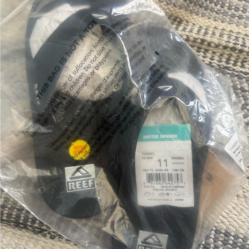 Brand New Reef Black and Silver Sandals with Opener